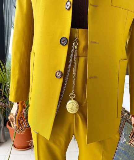 The “ Festac 77” mustard yellow 3 button safari suit