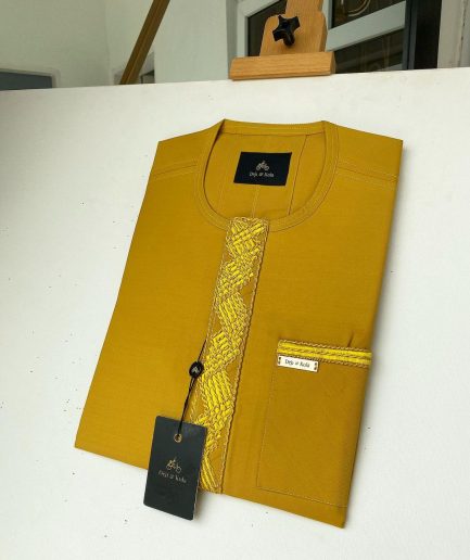 A Mustard Yellow Embroidery African kaftan with an interlocking lane design and sokoto