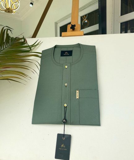 An Aqua green front flap African kaftan with Swarovski button and Sokoto
