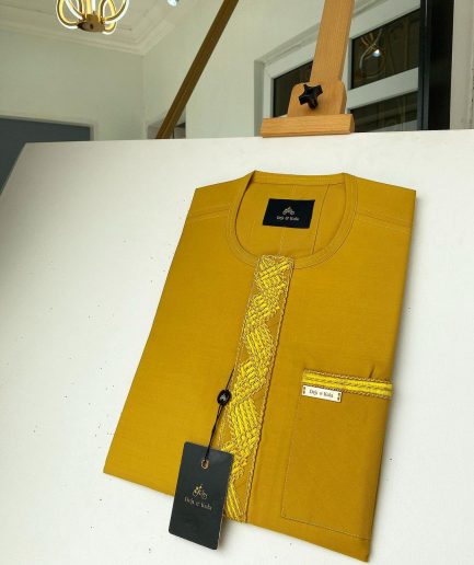 A Mustard Yellow Embroidery African kaftan with an interlocking lane design and sokoto