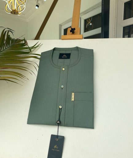 An Aqua green front flap African kaftan with Swarovski button and Sokoto