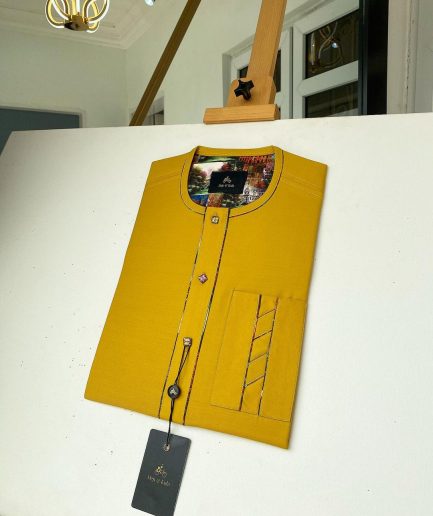 A Mustard Yellow with an interlocking lane design square-shaped buttons African kaftan