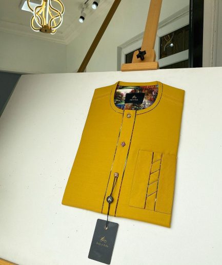A Mustard Yellow with an interlocking lane design square-shaped buttons African kaftan