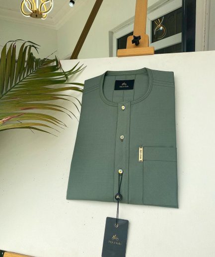 An Aqua green front flap African kaftan with Swarovski button and Sokoto