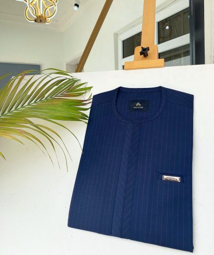 A Navy blue and red pinstripe African kaftan with an adjacent lane design and Sokoto