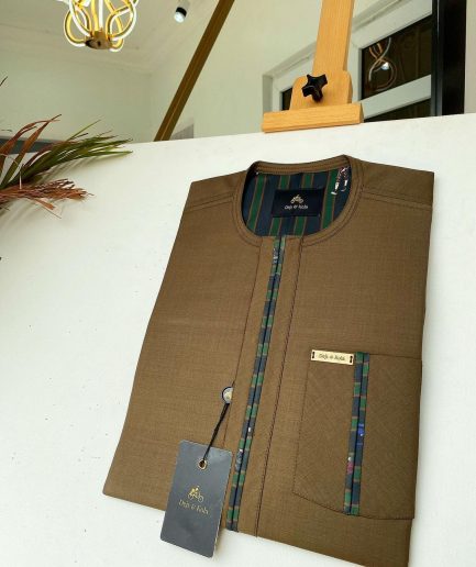 A brown African kaftan with a lining divisional design and Sokoto