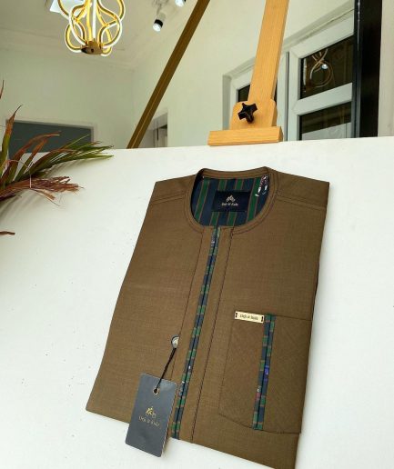 A brown African kaftan with a lining divisional design and Sokoto