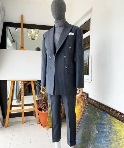 A Grey Pinstripe Peak Lapel Double Breasted Suit