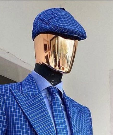 A Skye blue and white check men’s Kangol papas hat.