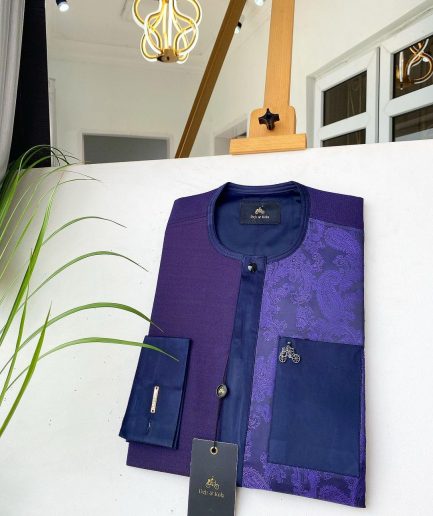 A dark purple matching paisley left section, and a silk blue flap and pocket with a Swarovski African Kaftan