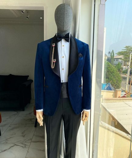 A Navy Blue Velvet Dinner Shawl Lapel Tuxedo Suit.