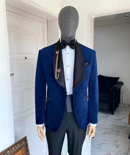 A Navy Blue Velvet Dinner Shawl Lapel Tuxedo Suit.