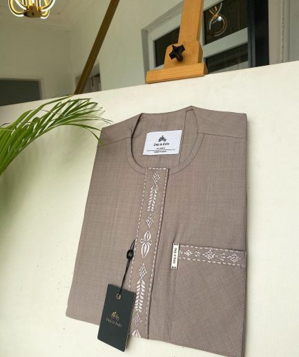 A light lilac senator African kaftan with a dispersed connected embroidery design