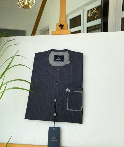 A dark grey stripe senator kaftan