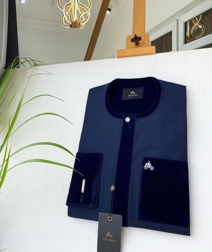 A Navy blue senator with a velvet flap pocket and cuff detail African Kaftan