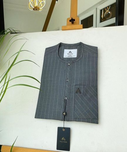 A light grey stripe front flap, Swarovski stone button with a maze line design African kaftan