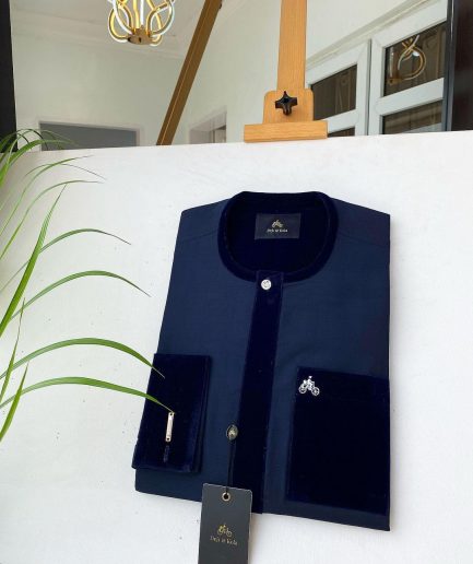 A Navy blue senator with a velvet flap pocket and cuff detail African Kaftan
