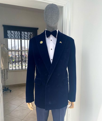 A Navy Blue Peak Lapel Double Breasted Soaked Italian Velvet Tuxedo Suit