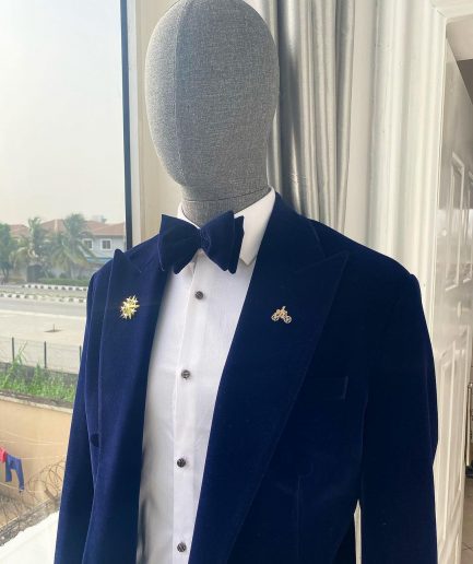 A Navy Blue Peak Lapel Double Breasted Soaked Italian Velvet Tuxedo Suit