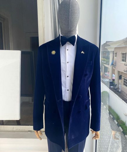 A Navy Blue Peak Lapel Double Breasted Soaked Italian Velvet Tuxedo Suit