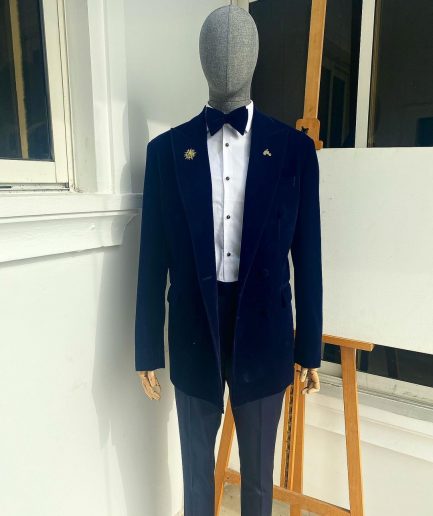 A Navy Blue Peak Lapel Double Breasted Soaked Italian Velvet Tuxedo Suit