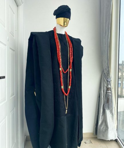 A charcoal black aso oke agbada with box patter embroidery design