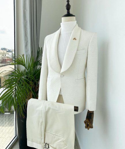 An Ivory White dispersed unequal pattern shawl lapel jacquard texedo suit.