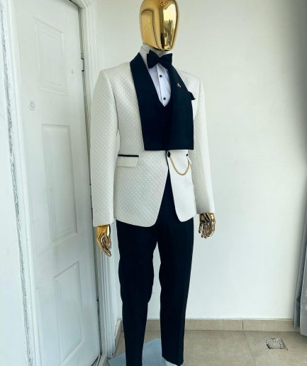 An Ivory white shawl lapel square pattern jacquard tuxedo suit.