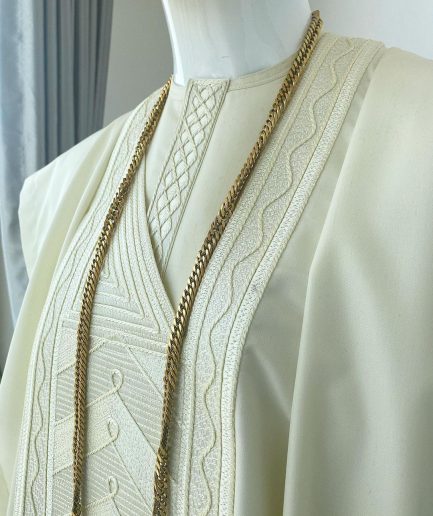 A cream African Agbada with interwoven embroidery design, short sleeve senator kaftan and sokoto
