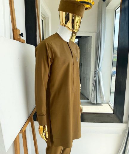 A Carton brown front flap detailing African kaftan