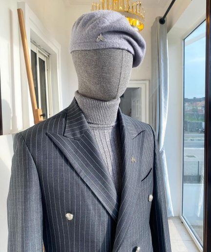 A Classic Peak Lapel Grey Pin Stripe Double Breasted Suit