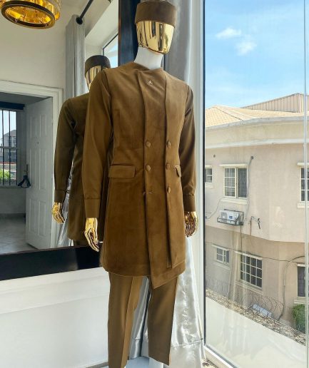 A monochrome light brown Greek military jacket, senator kaftan and sokoto from “Ayeye” Ijade 20/21 “Balogun”