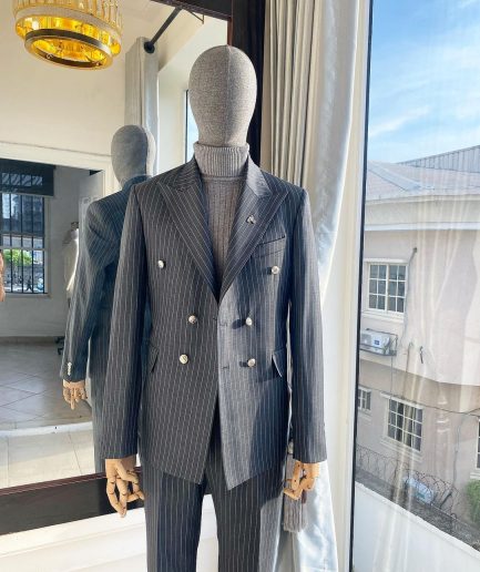 A Classic Peak Lapel Grey Pin Stripe Double Breasted Suit