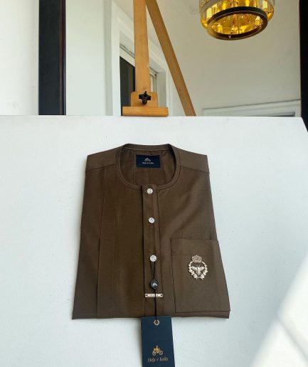 A Brown kaftan, button front flap, gold metal detailing, and silver Swarovski African Kaftan and Sokoto