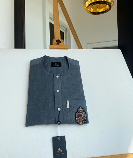 An Irish grey kaftan, button front flap, hand embroidery patch detailing, and a silver Swarovski African Kaftan and Sokoto
