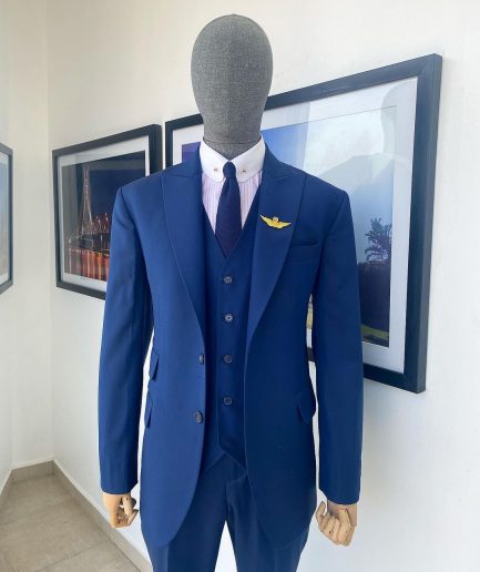 A “Board Room” Navy Blue Peak Lapel Suit
