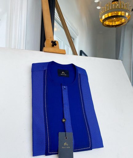 A related shade of blue rectangular front flap with clear view Swarovski button senator kaftan native