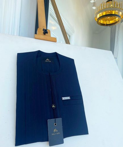 A pencil stripe midnight blue, lanes pocket, lanes front flap African traditional senator kaftan native.