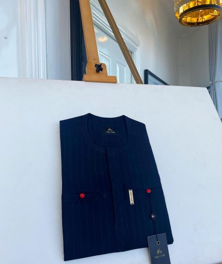 A pencil stripe midnight blue owl eye, double pocket, front flap African traditional senator kaftan native.
