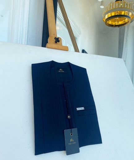 A pencil stripe midnight blue, lanes pocket, lanes front flap African traditional senator kaftan native.