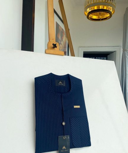 A Navy blue pencil stripe with reverse line pocket, zip line front flap, African kaftan native