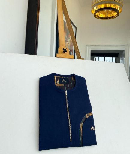 A Navy blue, curved rainbow pocket, gold zip line detailing African traditional senator kaftan
