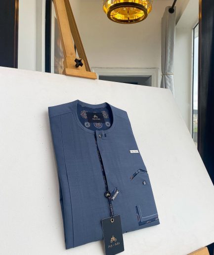 An air-force blue strap and roof pocket, single button front flap Kaftan