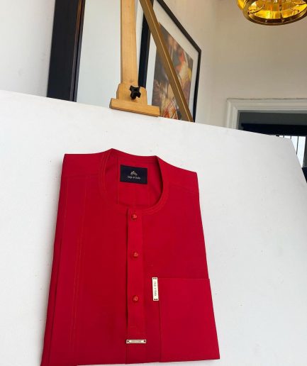 A lipstick red, patch pocket, front flap with clear view lipstick red Swarovski button details African Kaftan