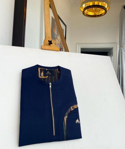 A Navy blue, curved rainbow pocket, gold zip line detailing African traditional senator kaftan