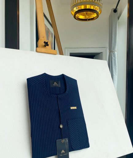 A Navy blue pencil stripe with reverse line pocket, zip line front flap, African kaftan native