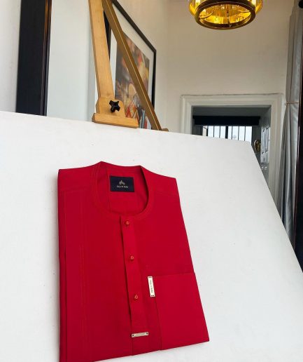 A lipstick red, patch pocket, front flap with clear view lipstick red Swarovski button details African Kaftan