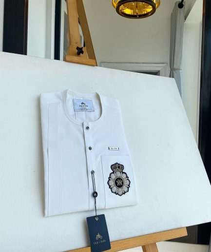 A White, patch pocket, front flap with clear view jet black Swarovski button details African kaftan