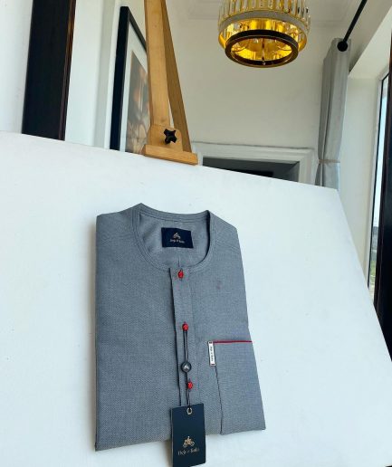 A grey, patch pocket and front flap with a clear view lipstick red Swarovski African kaftan