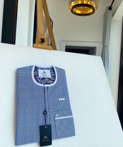 A blue and white windowpane check, front flap details African traditional senator kaftan native.
